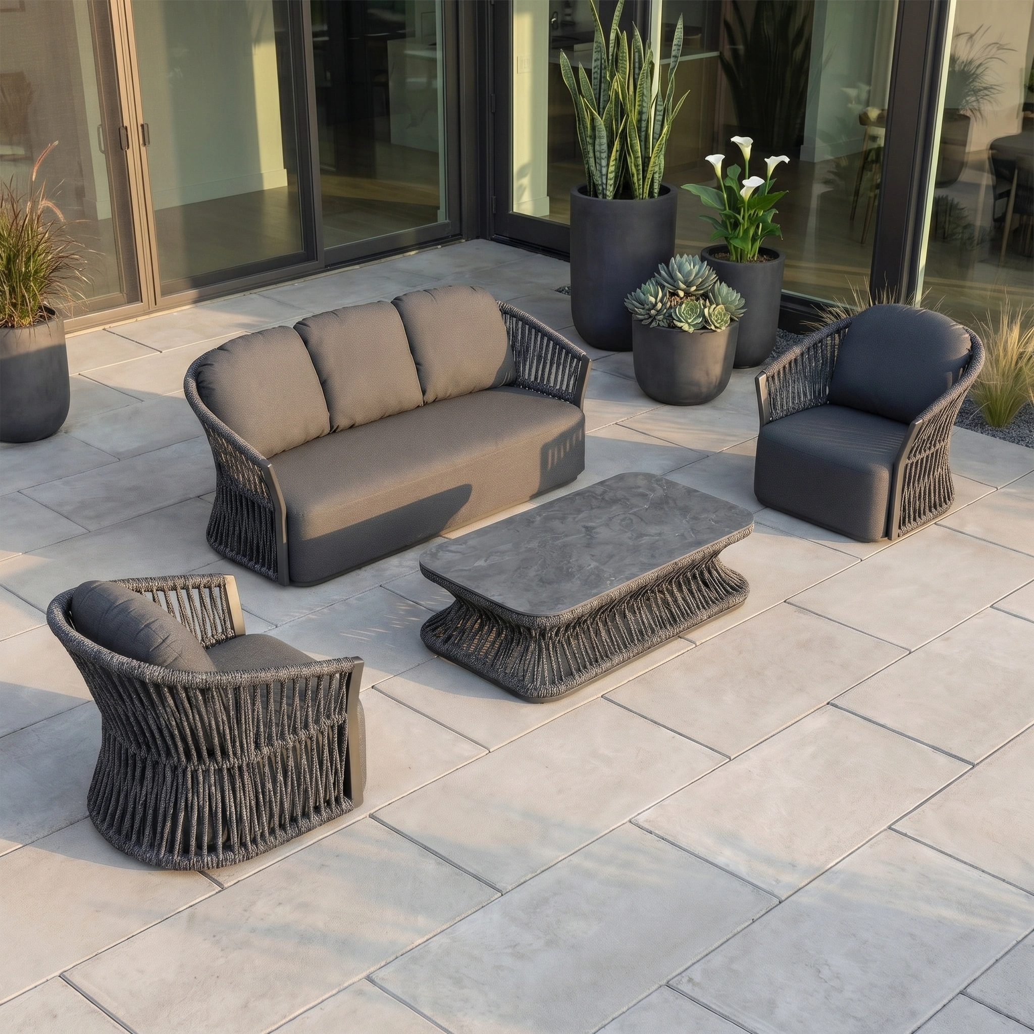 The Pello 3 Seat Sofa Set in Grey with quick-dry cushions and a chic table elevates this garden furniture setup on a tiled patio.