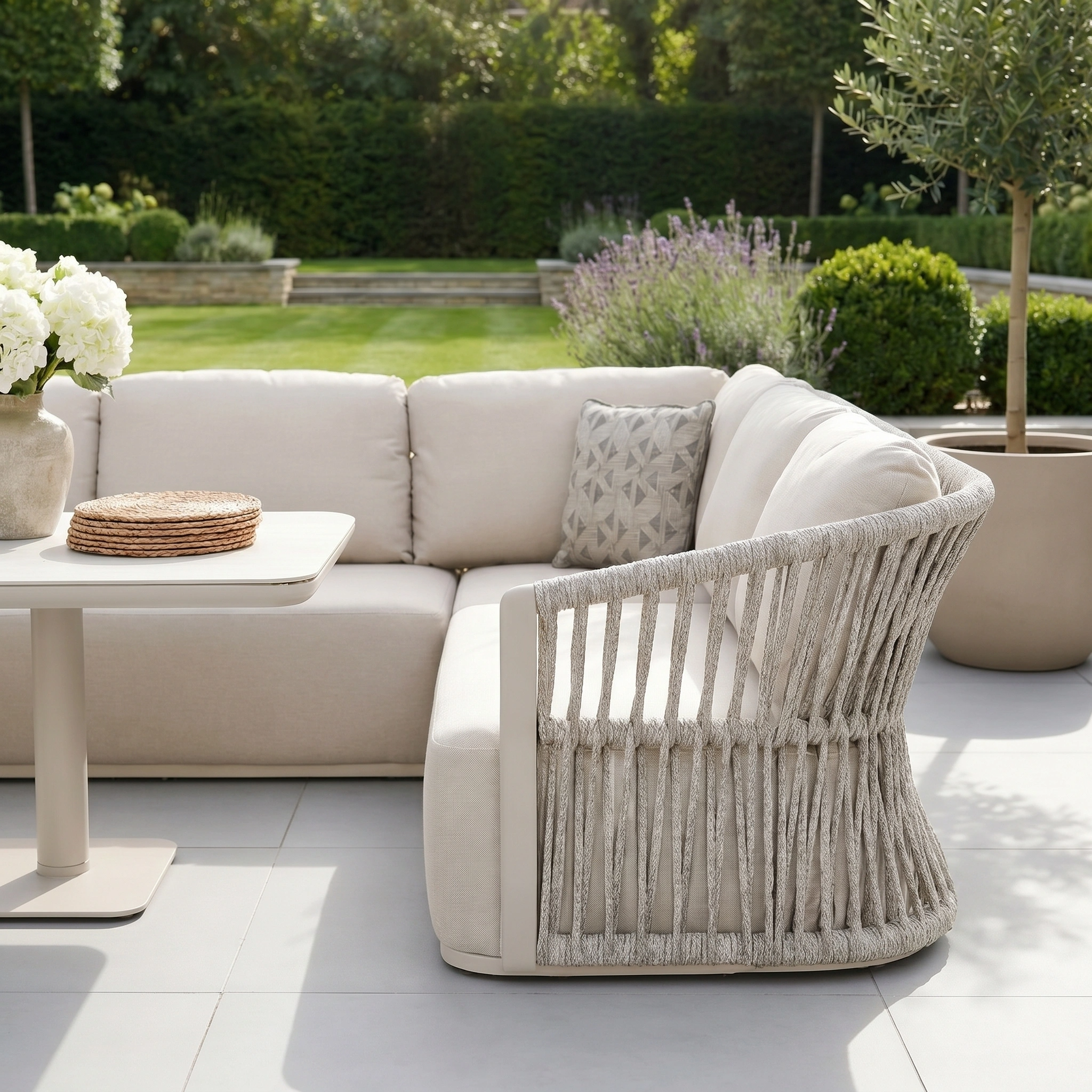 The Pello U-Shape Corner Sofa Set with Altura Rising Table in Fawn offers a stylish, modern garden furniture arrangement with its curved design and versatile rising table.