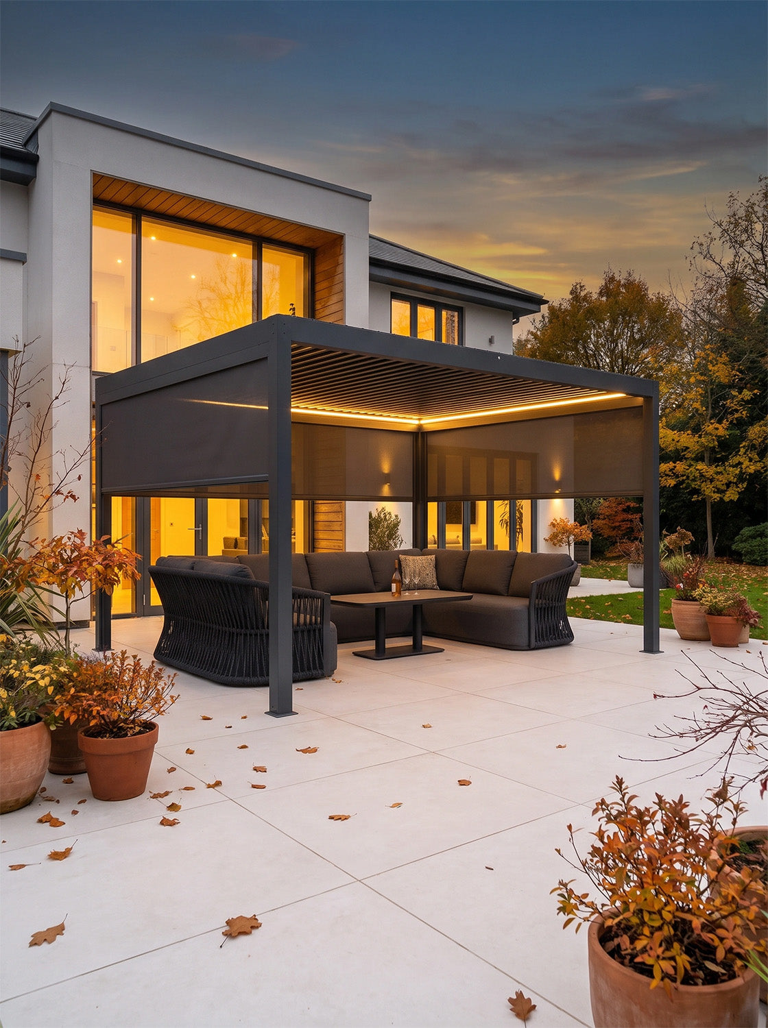 a patio with a covered patio and a table and chairs