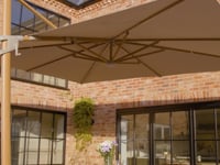 Volos 3m x 4m Aluminium Cantilever Parasol with LED Lighting and 120kg Granite Base in Wheat
