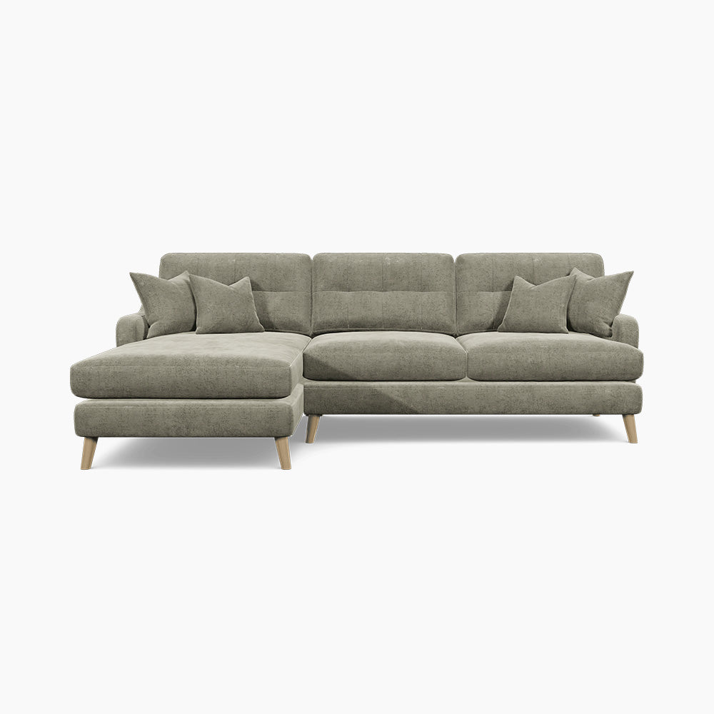 a grey couch with a chaise