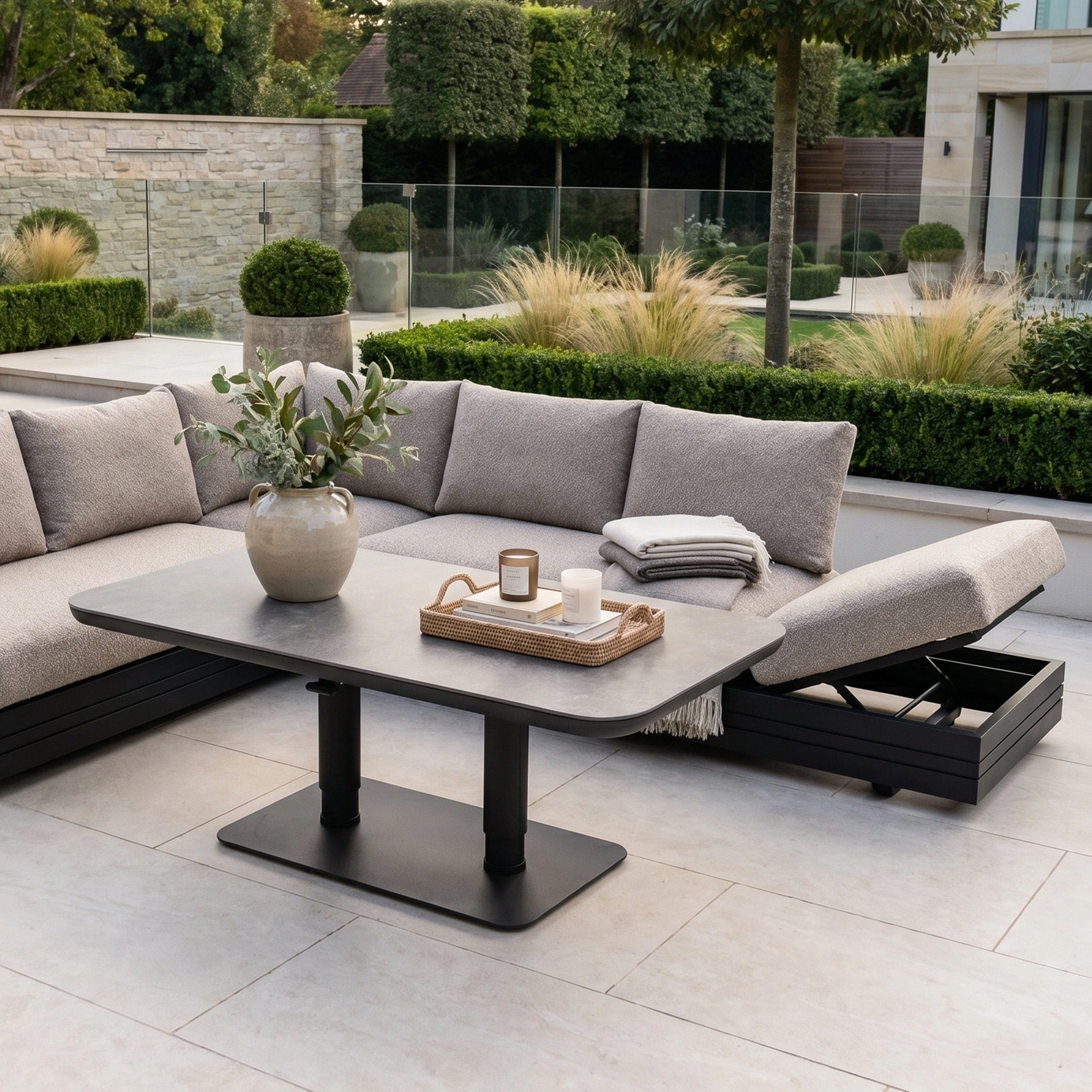 Modern patio with the Savona Luxury Outdoor Large Corner Sofa Set in Truffle and Altura Rising Table—perfect modular garden furniture for stylish relaxation.
