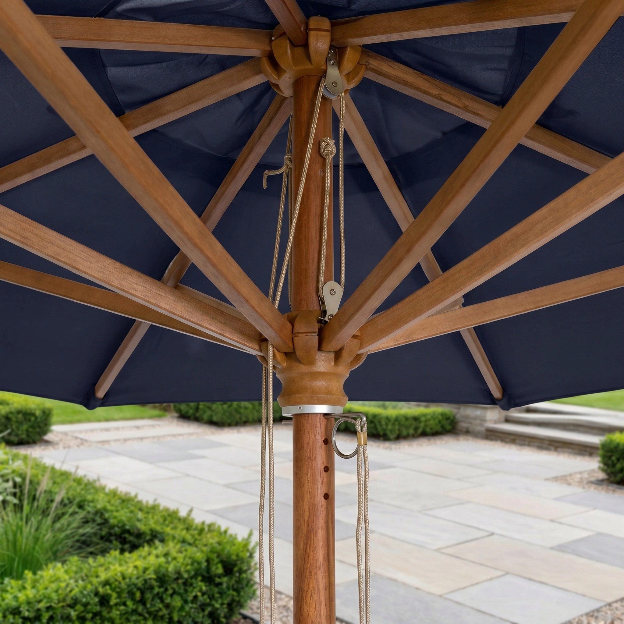 Close-up of the Styx 3m x 2m Rectangular Deluxe Wooden Parasol in Navy, highlighting the premium eucalyptus wood frame and pulley system.