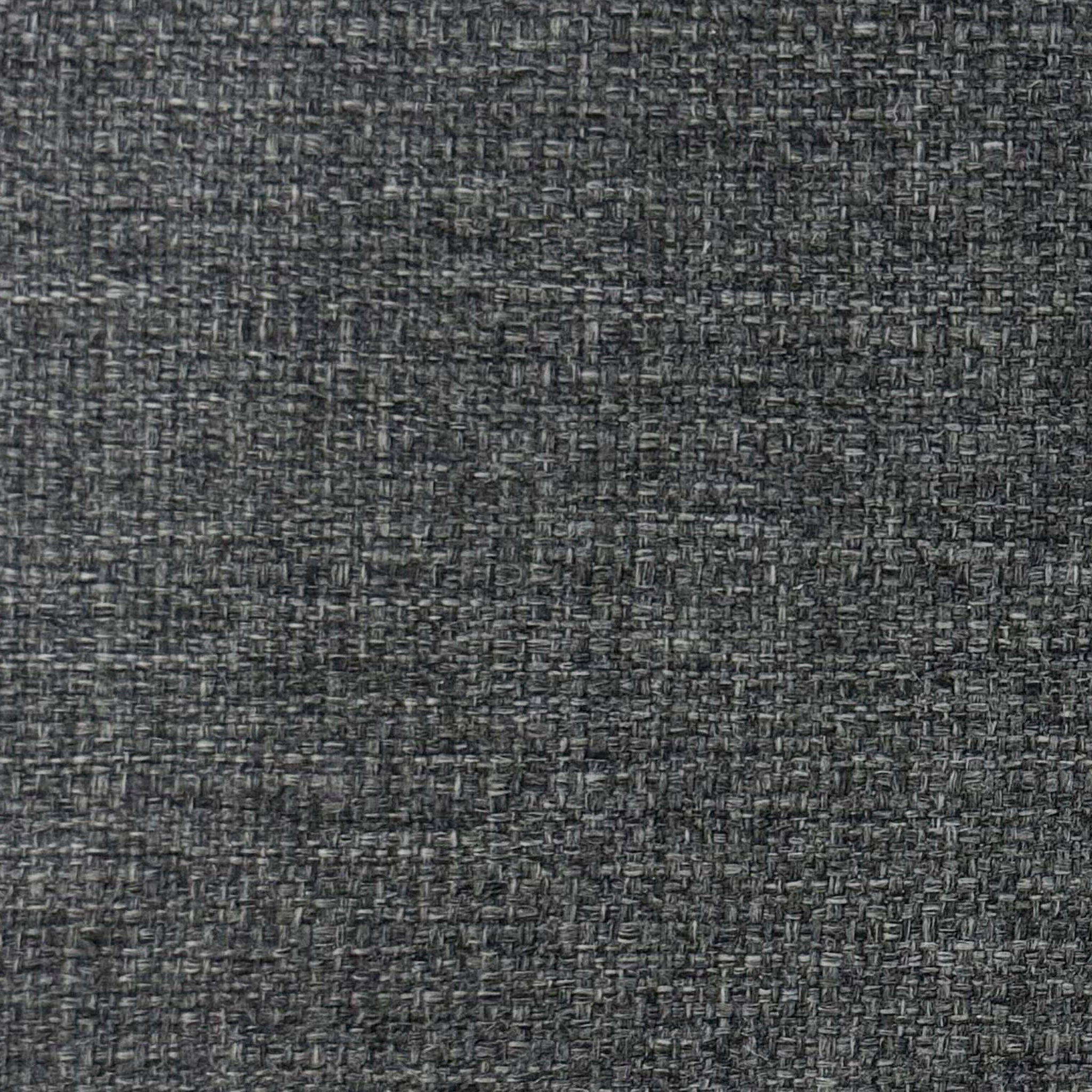 The Textured Charcoal features a dark gray fabric with a woven pattern of intersecting lines, offering a subtle and uniform appearance.