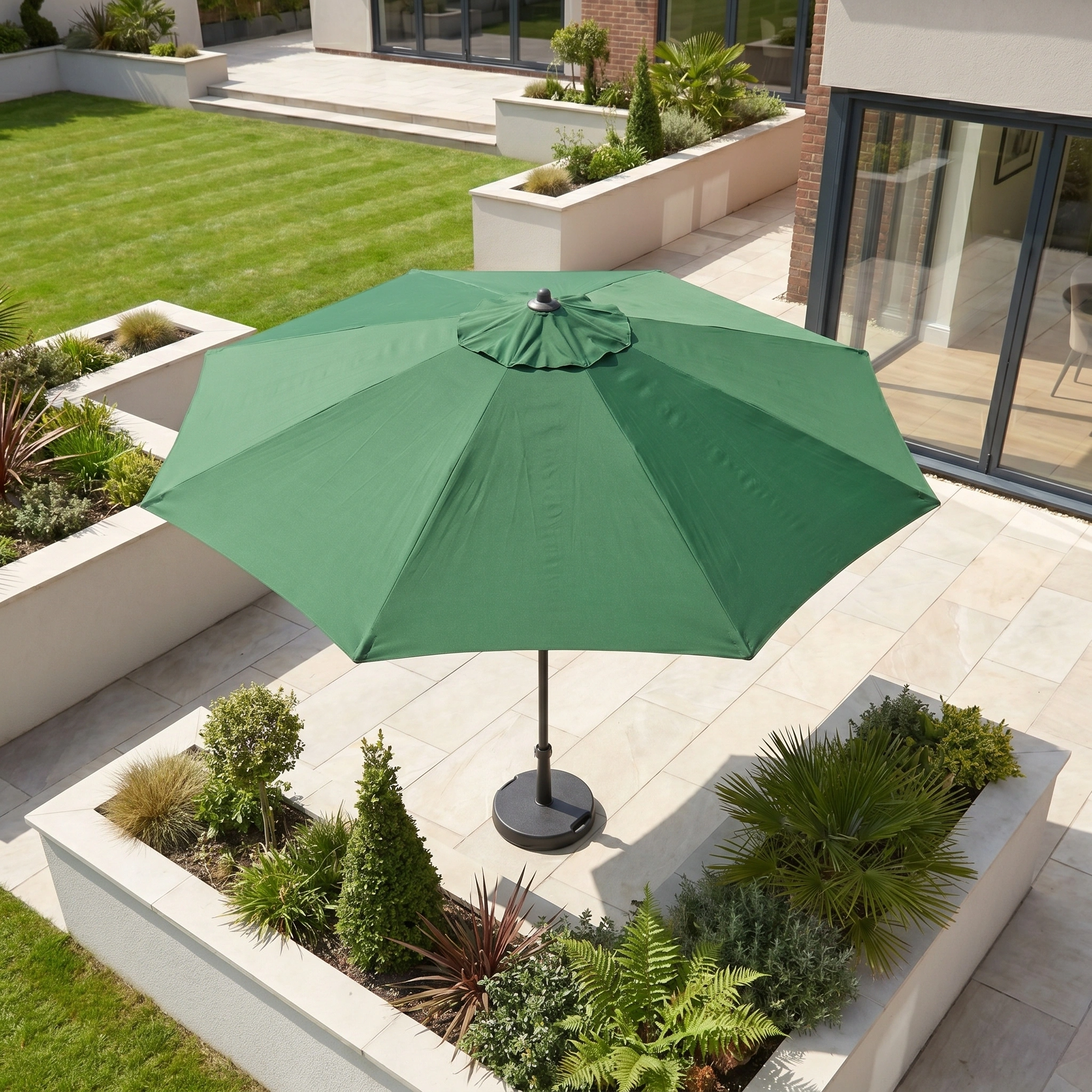 The Triton 3m Round Aluminium Parasol in Green shades your patio or garden, providing UV protection for relaxing moments outdoors by your modern home.