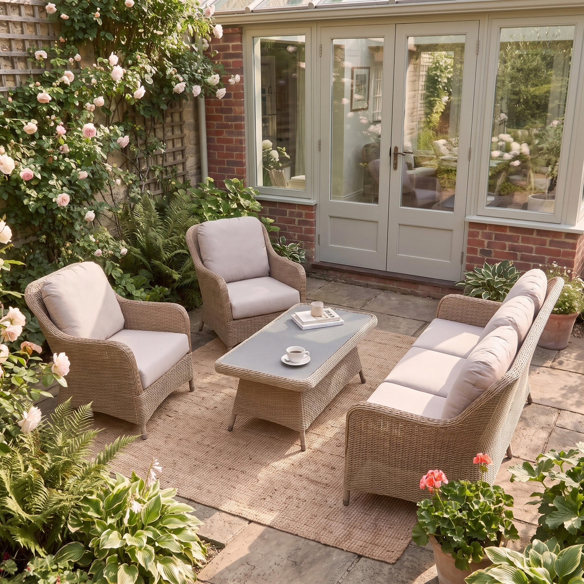 a patio area with chairs and a table