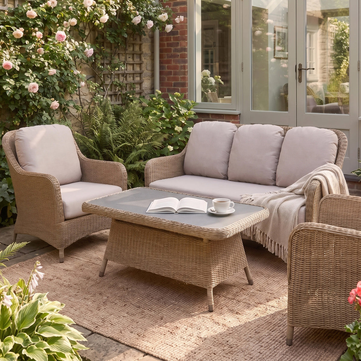 a patio area with a table and chairs