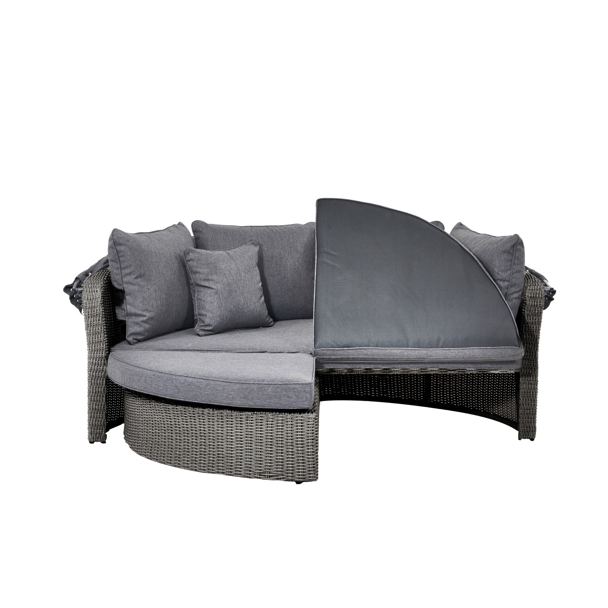 Meet the Pacific Lifestyle - Bermuda Daybed in Slate Grey: a round wicker sectional with gray cushions, featuring a retractable canopy. This weatherproof piece blends comfort and space-saving design, ideal for any outdoor oasis.