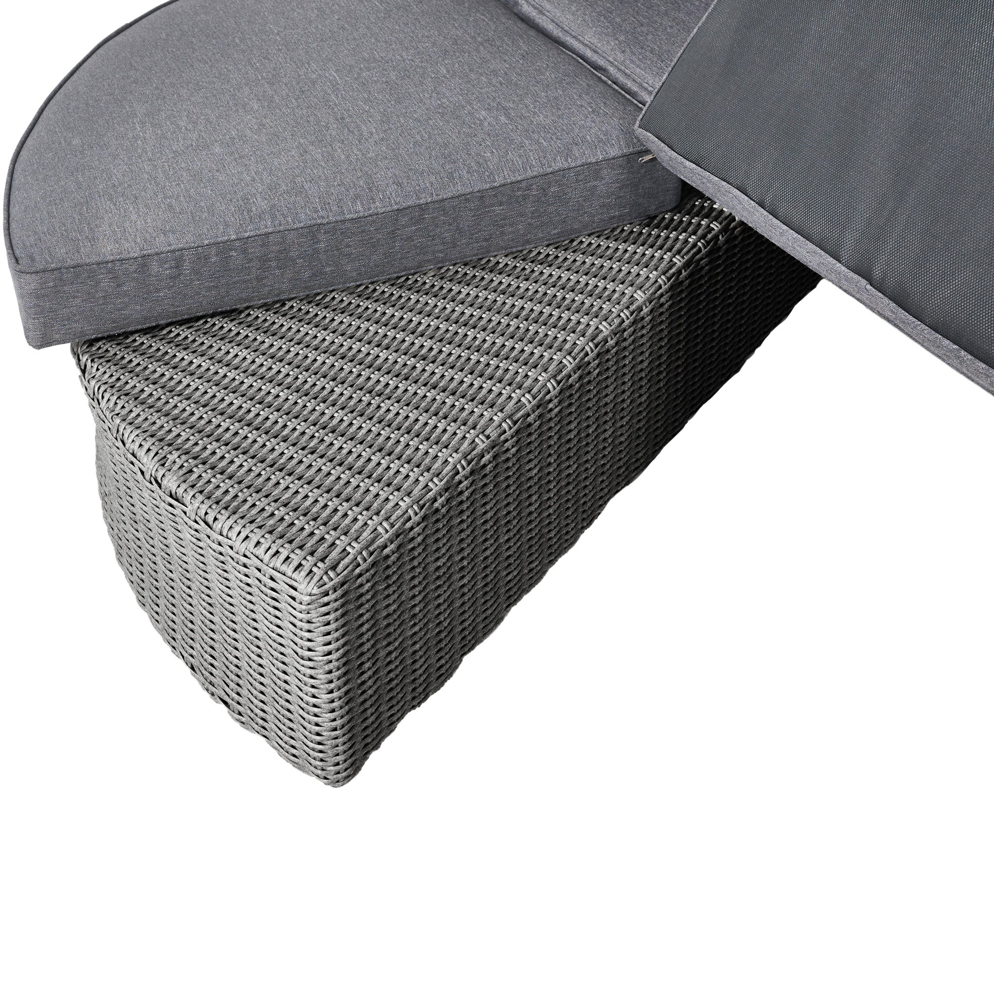 Close-up of a triangular Pacific Lifestyle Bermuda Daybed in Slate Grey, featuring gray cushions and a space-saving design akin to the luxurious original.