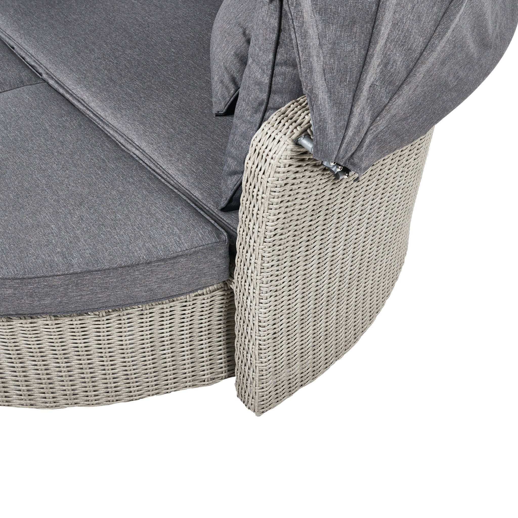 The Pacific Lifestyle Bermuda Daybed in Stone Grey, made from weatherproof materials, offers a gray wicker design and an adjustable canopy for superb comfort.