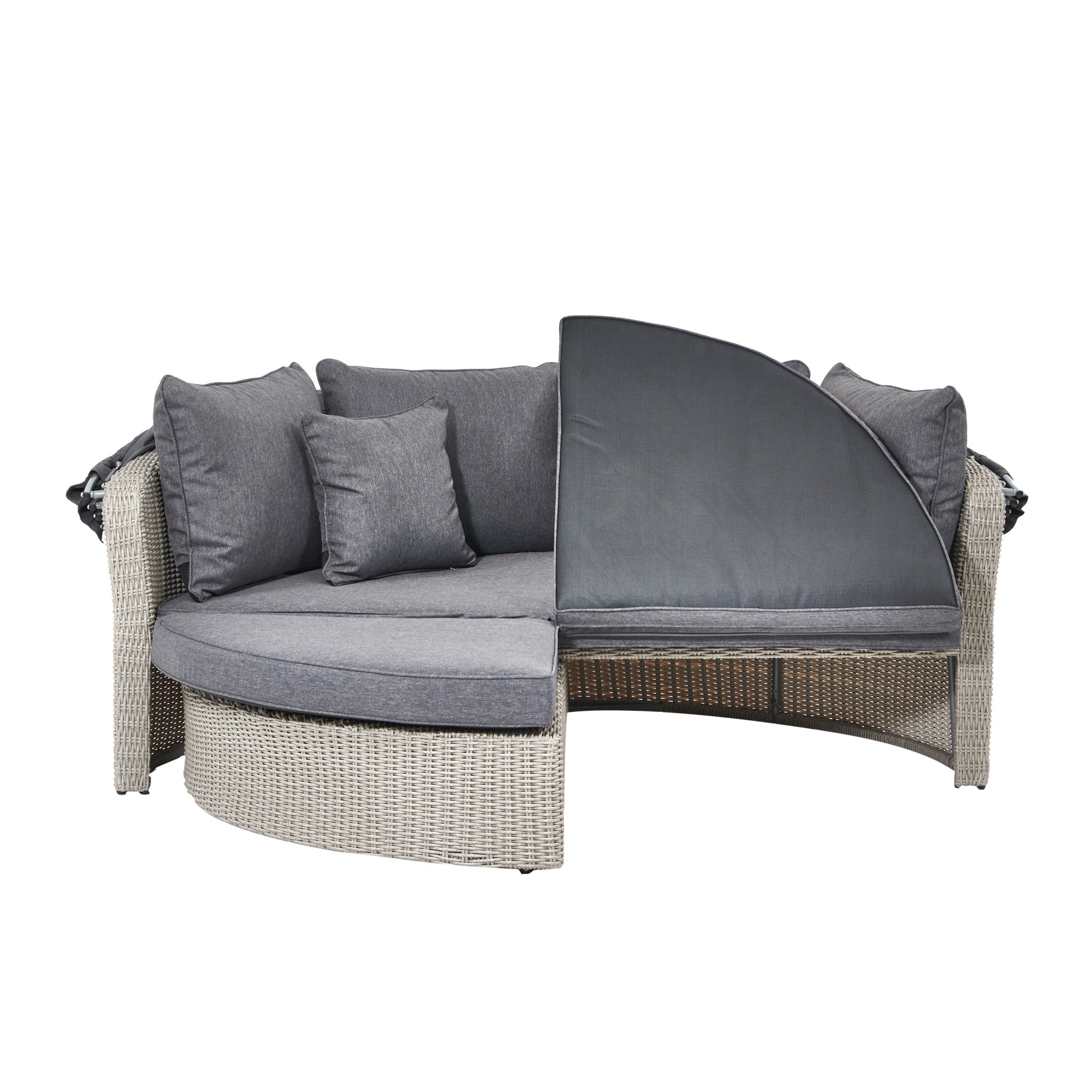 Relax in the Pacific Lifestyle Bermuda Daybed in Stone Grey, a round outdoor wicker couch with comfy cushions and a half-raised canopy. Made from weatherproof materials, it's perfect for enjoying the outdoors.