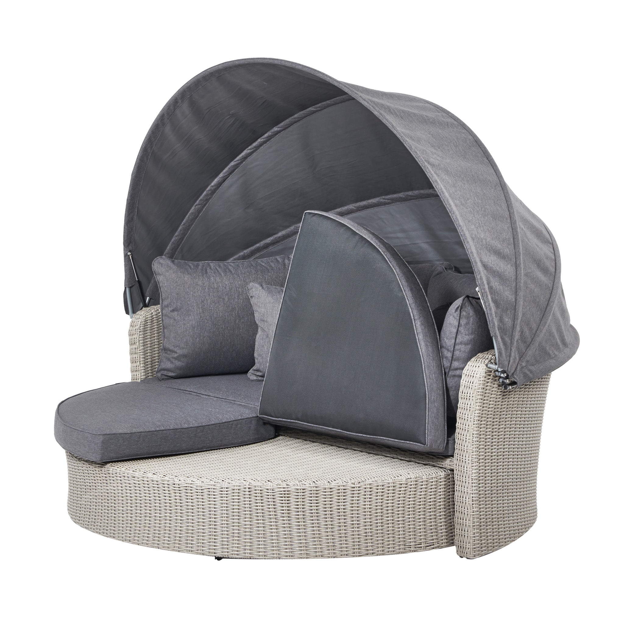 The Pacific Lifestyle - Bermuda Daybed in Stone Grey is a round wicker outdoor bed with a grey canopy and cushions, crafted from weatherproof material for shade and comfort.