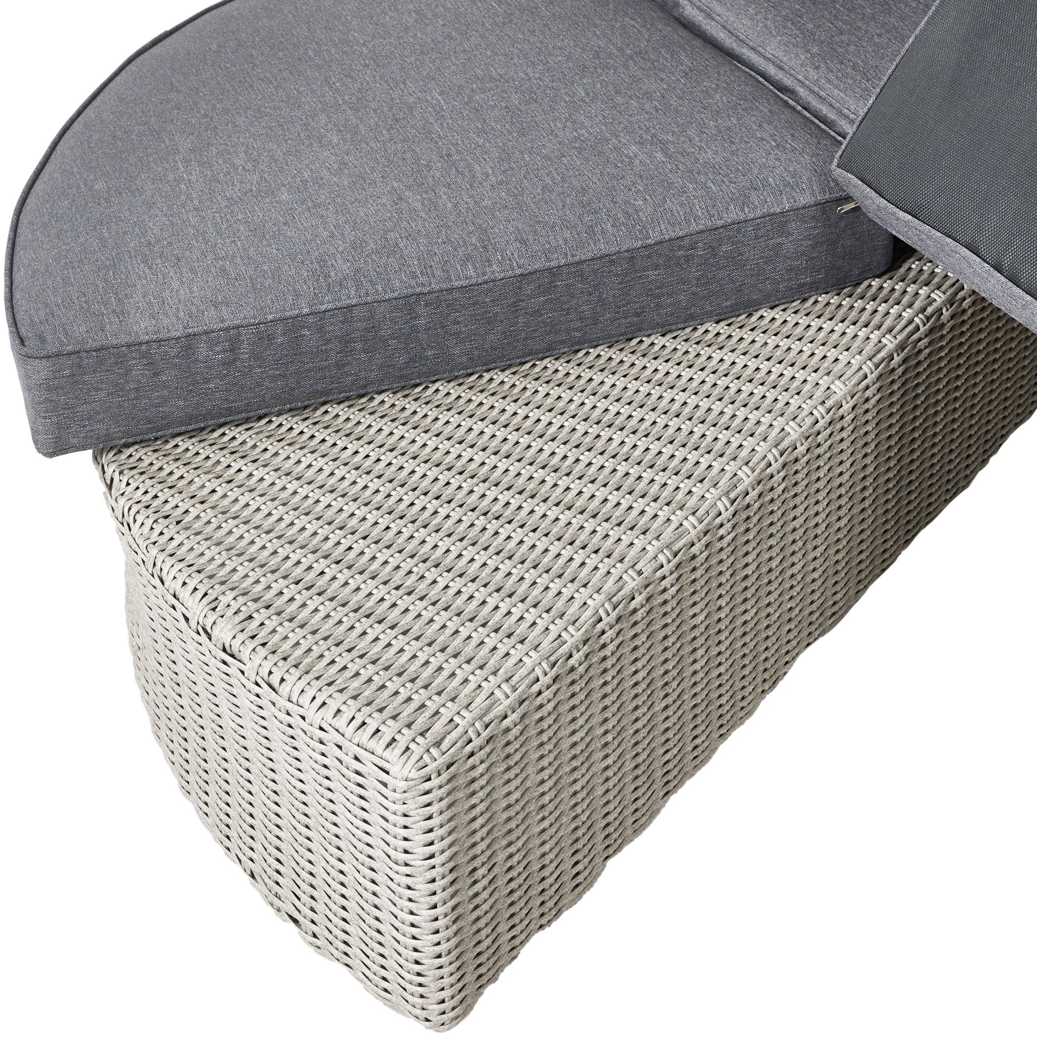 The Pacific Lifestyle - Bermuda Daybed in Stone Grey, made from woven rattan and weatherproof material, includes plush gray cushions and is elegantly shown from an overhead view.