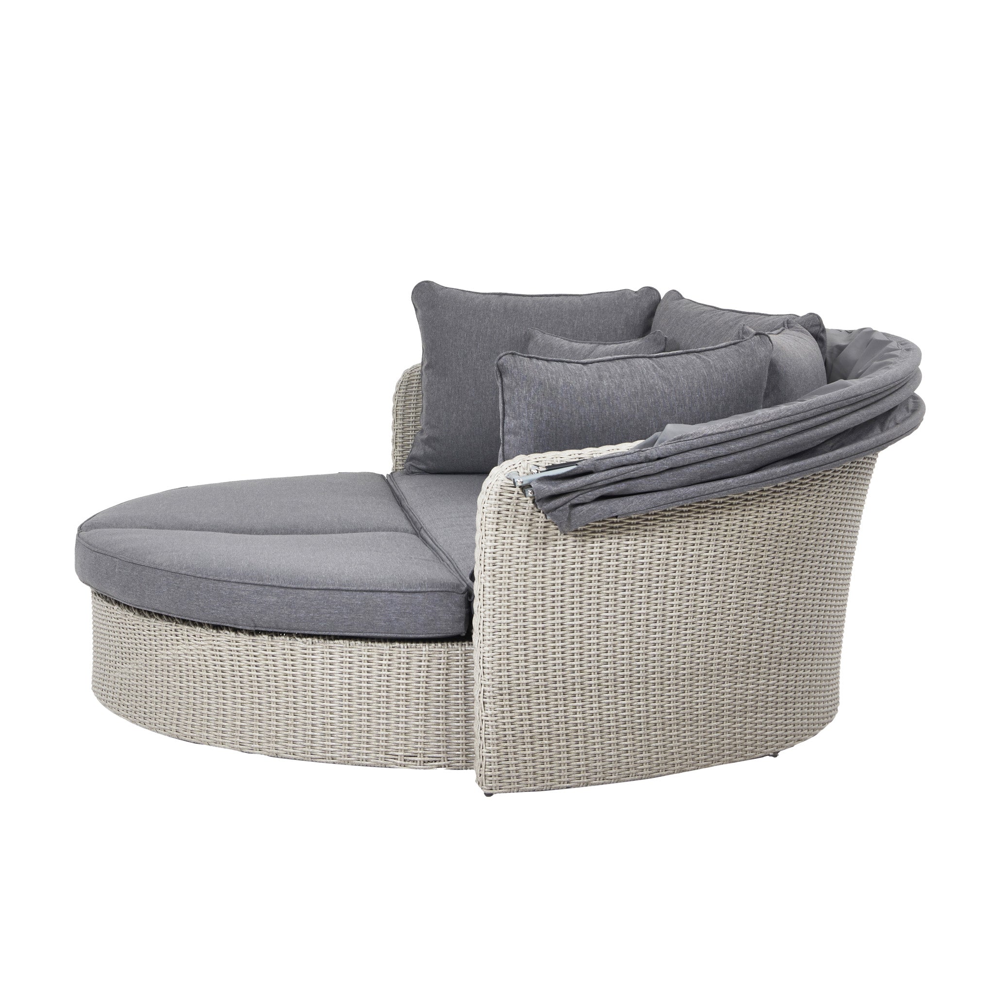 The Pacific Lifestyle Bermuda Daybed in Stone Grey is a round wicker outdoor daybed with grey cushions and an adjustable backrest, made from durable weatherproof materials.