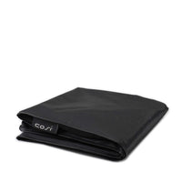 The Cosi - Cosiloft 120 Lounge All Weather Protection Cover, featuring a "cosi" tag on one edge, is folded for display on a plain white background.