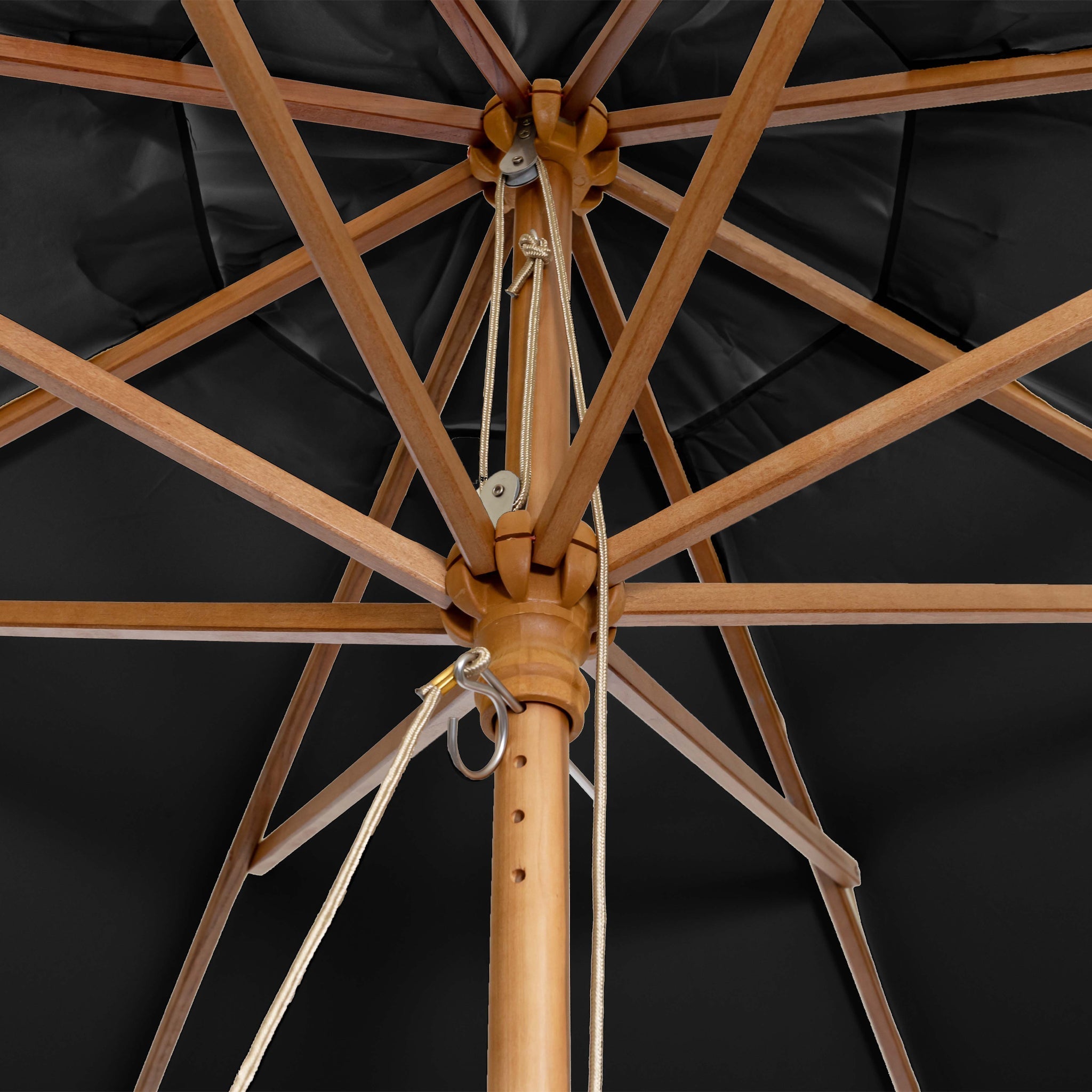 Underneath view of the Kratos 3m Round Wooden Parasol in Black, showcasing the wooden rib structure and pulley system. This dining table parasol boasts a UV rating of 50+.