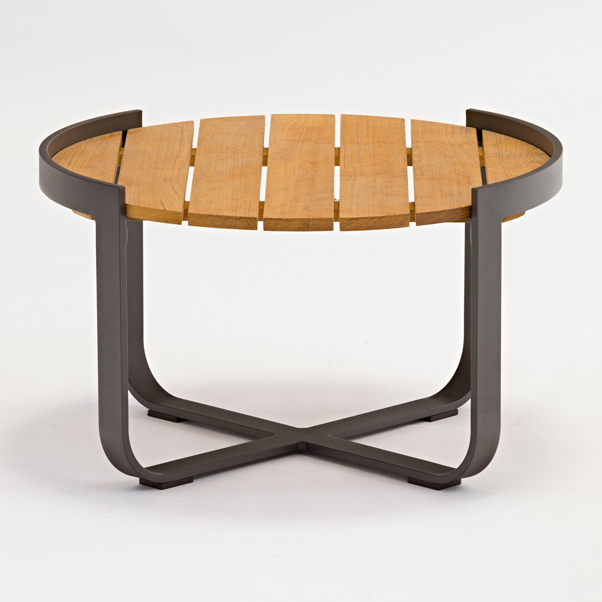 The Bloom Coffee Table with Teak Top in Charcoal features a round teak top with a black metal frame and X-shaped legs, making it ideal as outdoor furniture. Seen here on a plain white background.