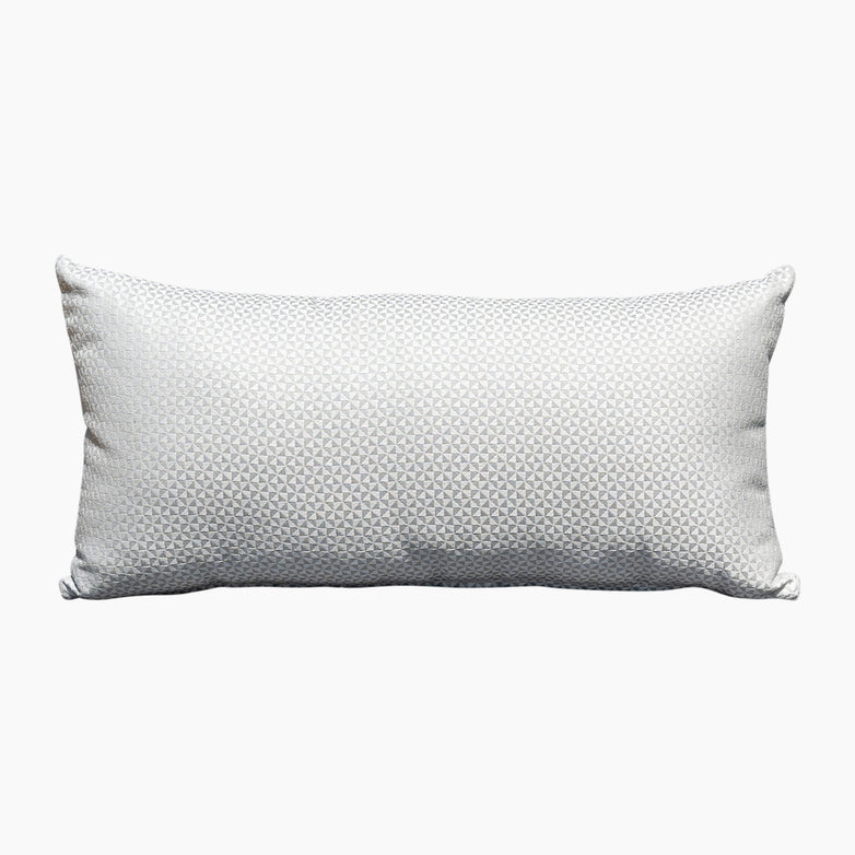 The Acrisol Helix Gris Claro Bolster Scatter Cushion, measuring 60cm x 30cm, is ideal for enhancing your Harbour Lifestyle cushions collection with its subtle textured pattern on a plain white background.