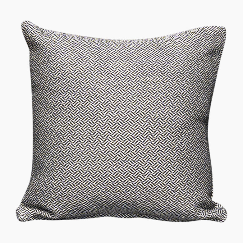 The Agora Vimini Pirita Small Scatter Cushion features a stylish black and white chevron pattern on a white background and is crafted from durable solution-dyed acrylic, making it an ideal choice for Harbour Lifestyle outdoor decor.