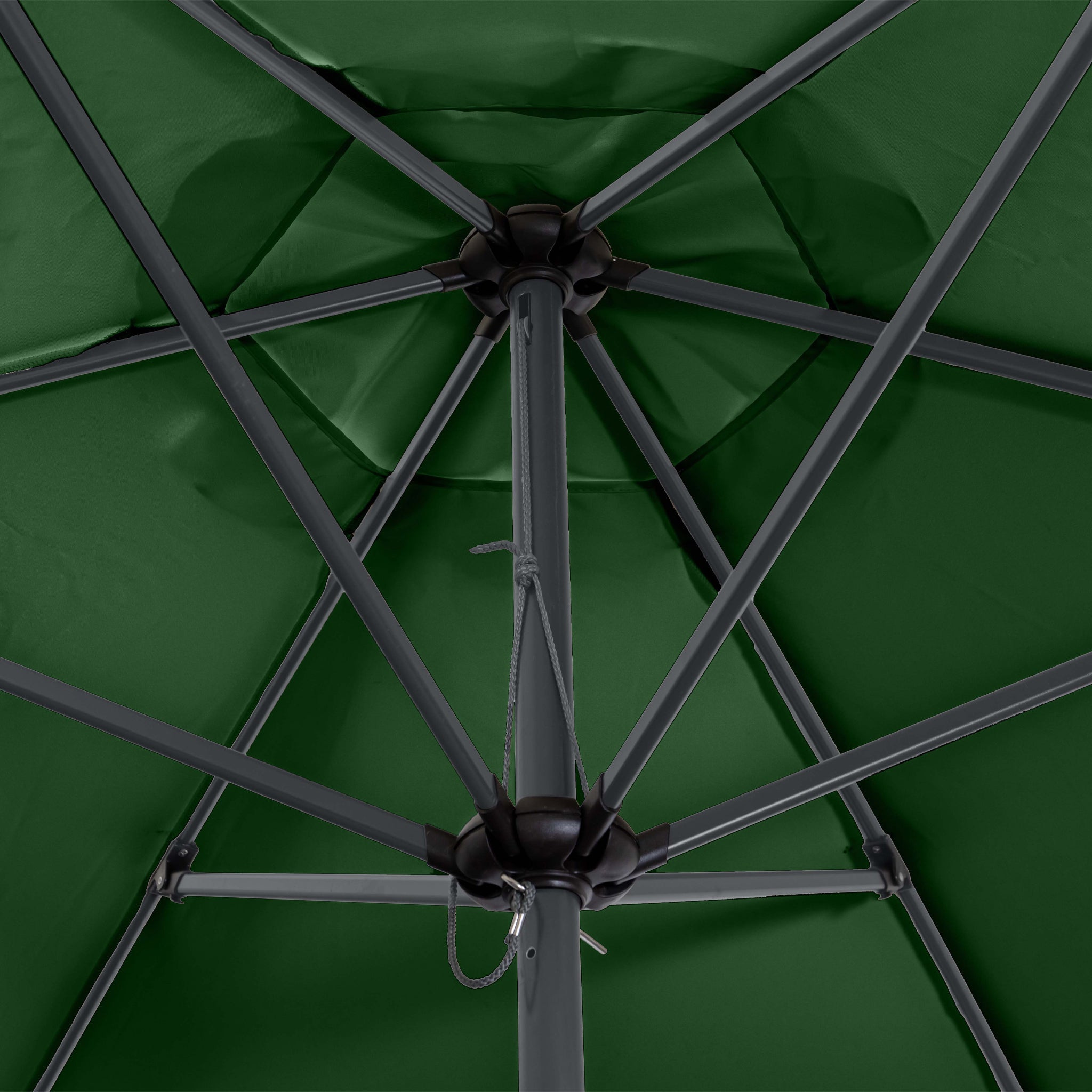 Inside view of the Triton 2.5m Round Aluminium Parasol in Green, showcasing its central pole and supporting metal framework. Featuring fade-resistant fabric and a UV rating of 50+, this parasol ensures long-lasting protection and durability.