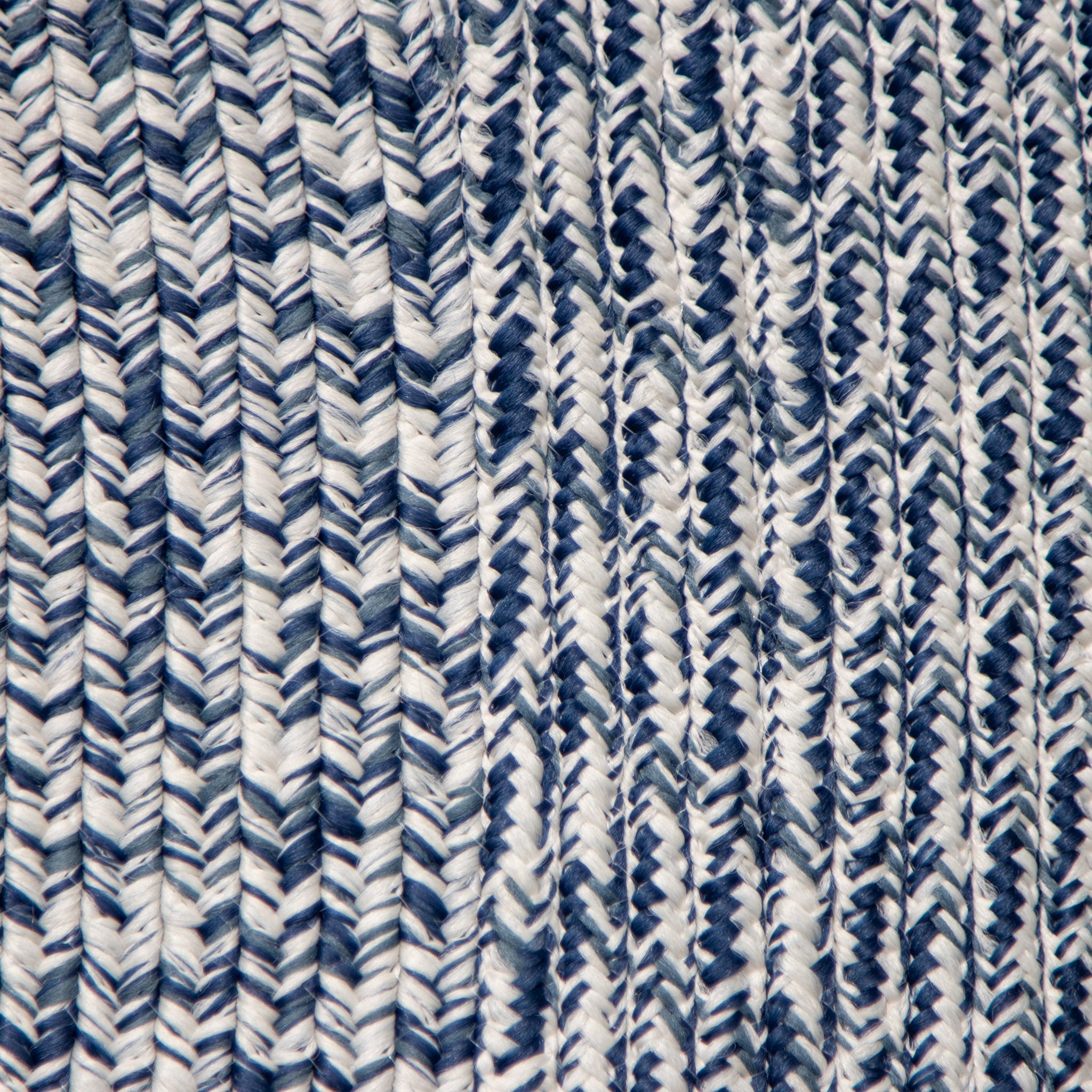 Close-up of the Apollo 300cm Round Indoor and Outdoor Rug in Prussian Blue, showcasing its textured fabric with alternating blue and white zigzag and vertical stripe patterns. This rug is designed to be both weatherproof and UV resistant.