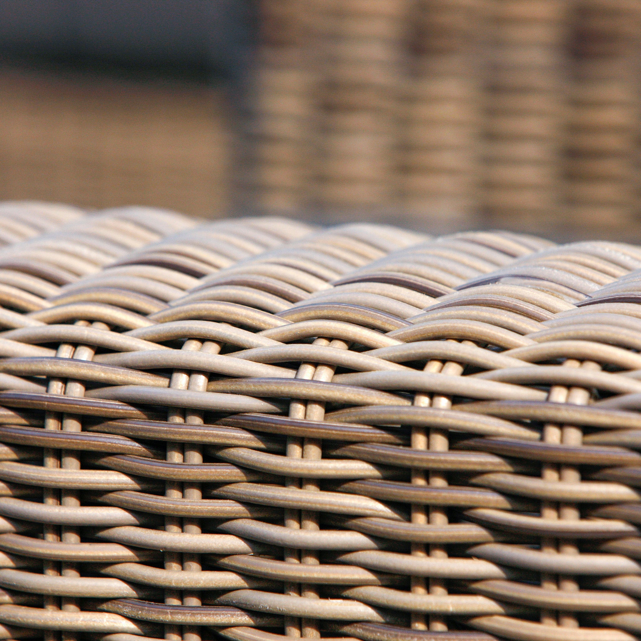 A close-up of the Kingston 3 Seat Sofa Set reveals intricate Hularo wicker patterns in beige and brown, reminiscent of the quality found in 4 Seasons Outdoor collections.