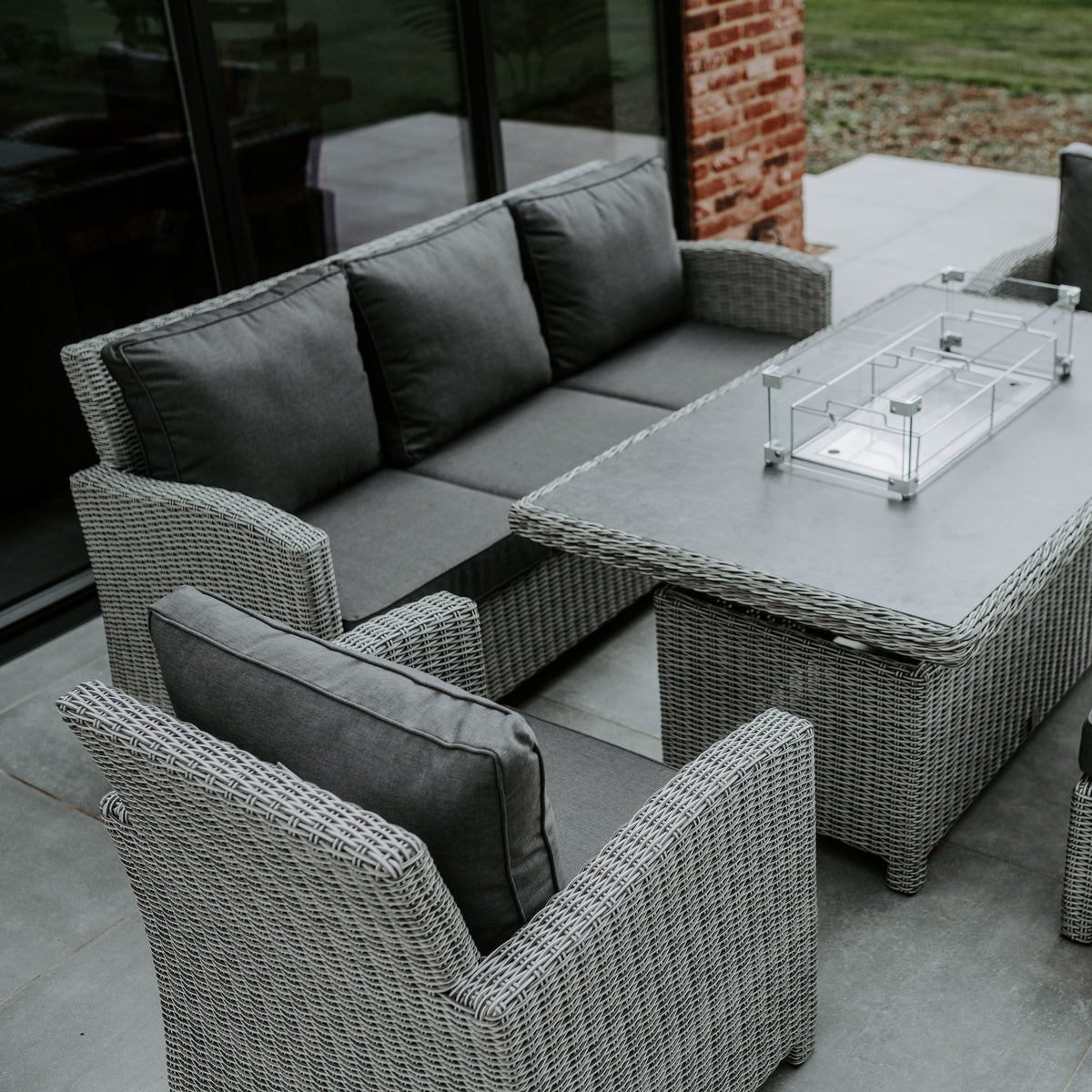Santiago Rattan Sofa Dining Set with Rising Firepit Table in Grey