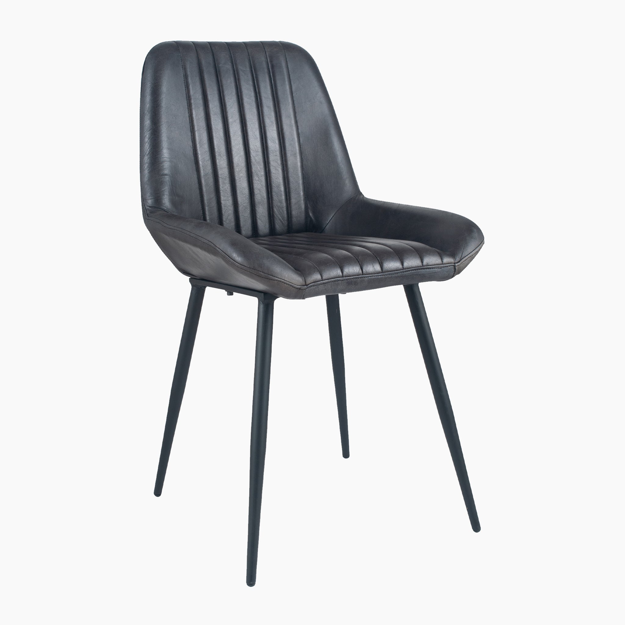 Introducing the Angelo Range Steel Grey dining chair by Pacific Lifestyle, featuring a padded seat, vertical stitching, and slender legs. Its sleek design adds a touch of elegance to any space.