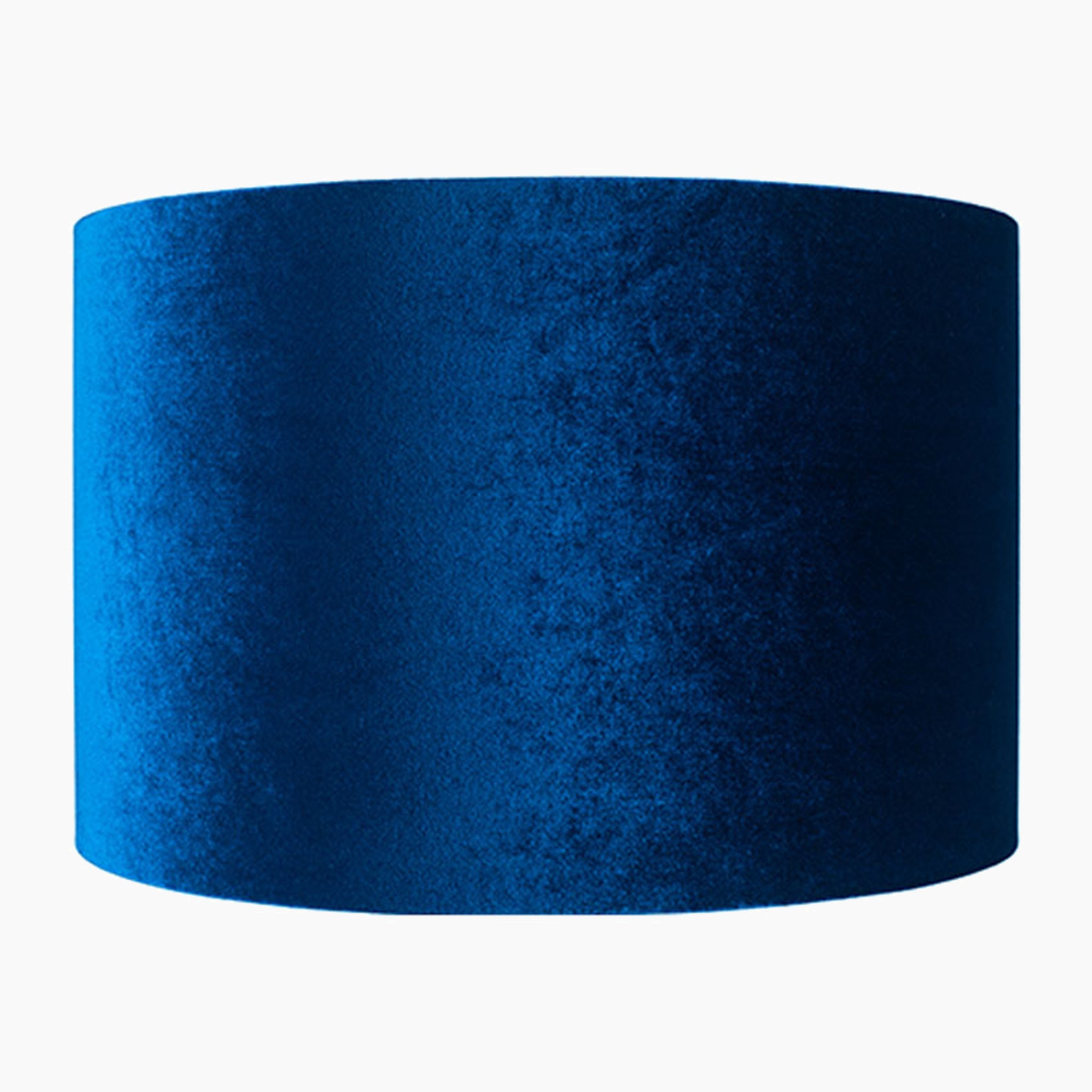 The Pacific Lifestyle - Bow 25cm sapphire velvet cylinder shade, set against a white background, exudes elegance and sophistication.