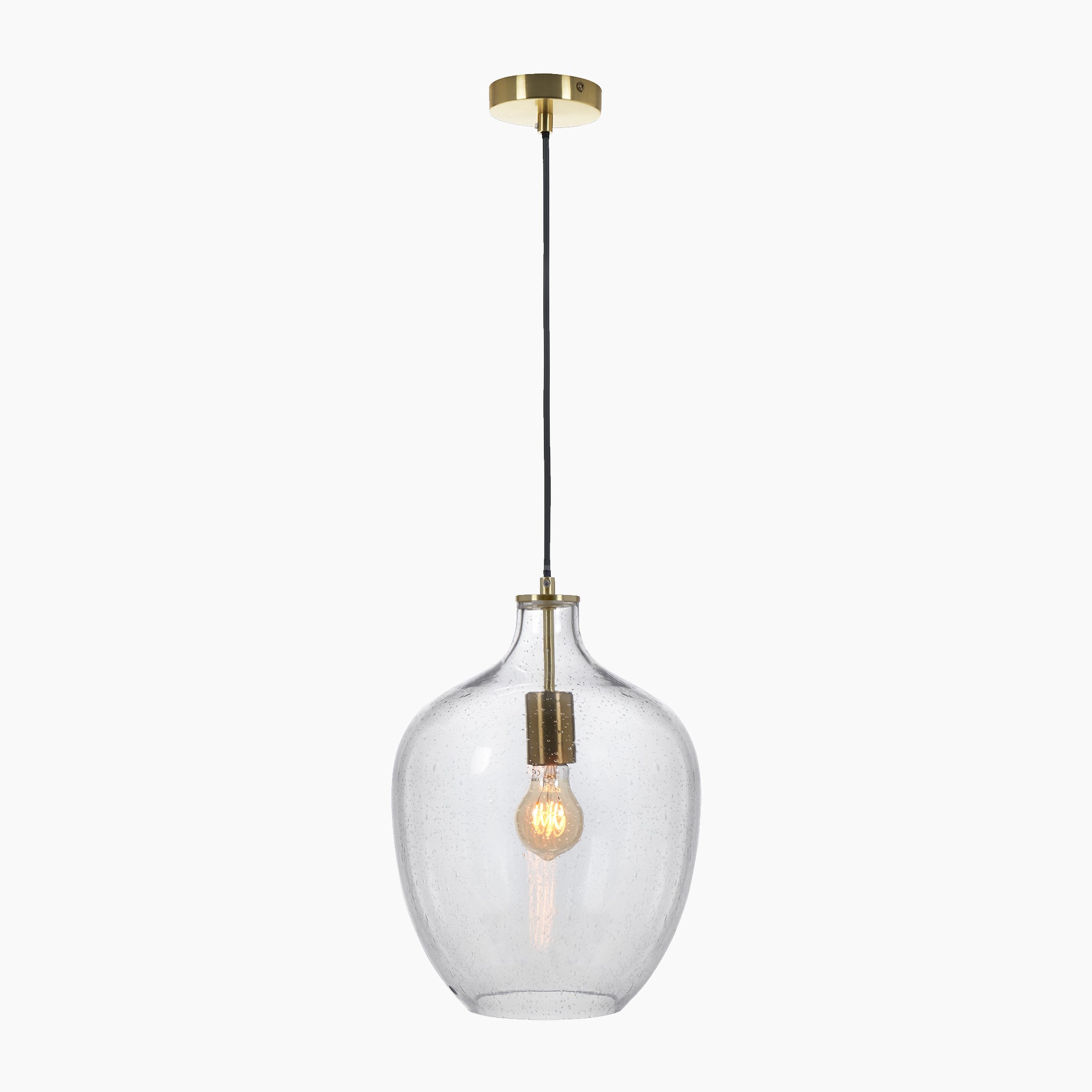 The Islay Clear Bubble Glass Pendant by Pacific Lifestyle features a modern design with clear glass and brass accents, showcasing an exposed bulb in a brushed gold holder.