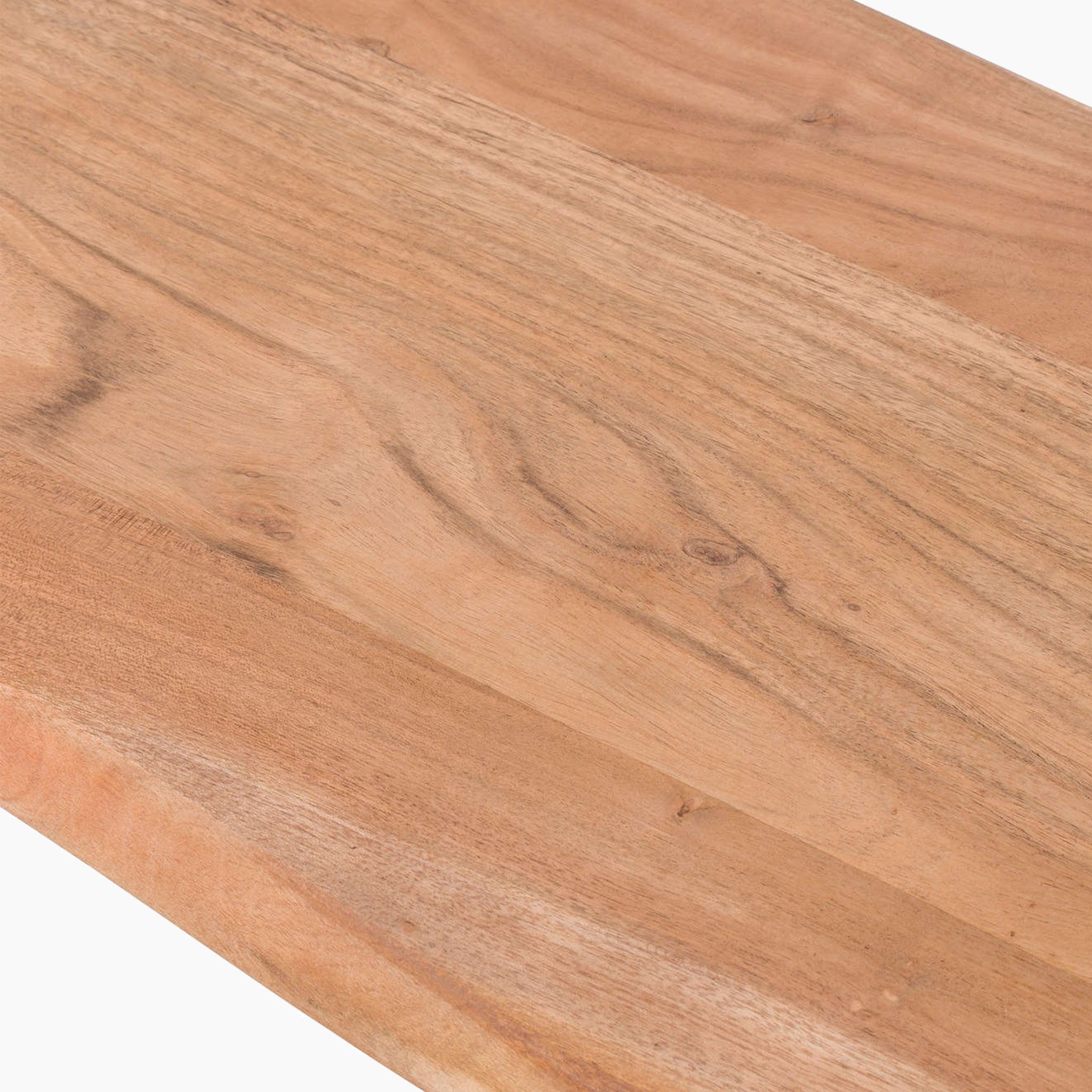 A close-up of a wooden surface with a light brown color and natural grain pattern, highlighting the handmade beauty of Indian acacia wood from our Live Edge Collection Bench.
