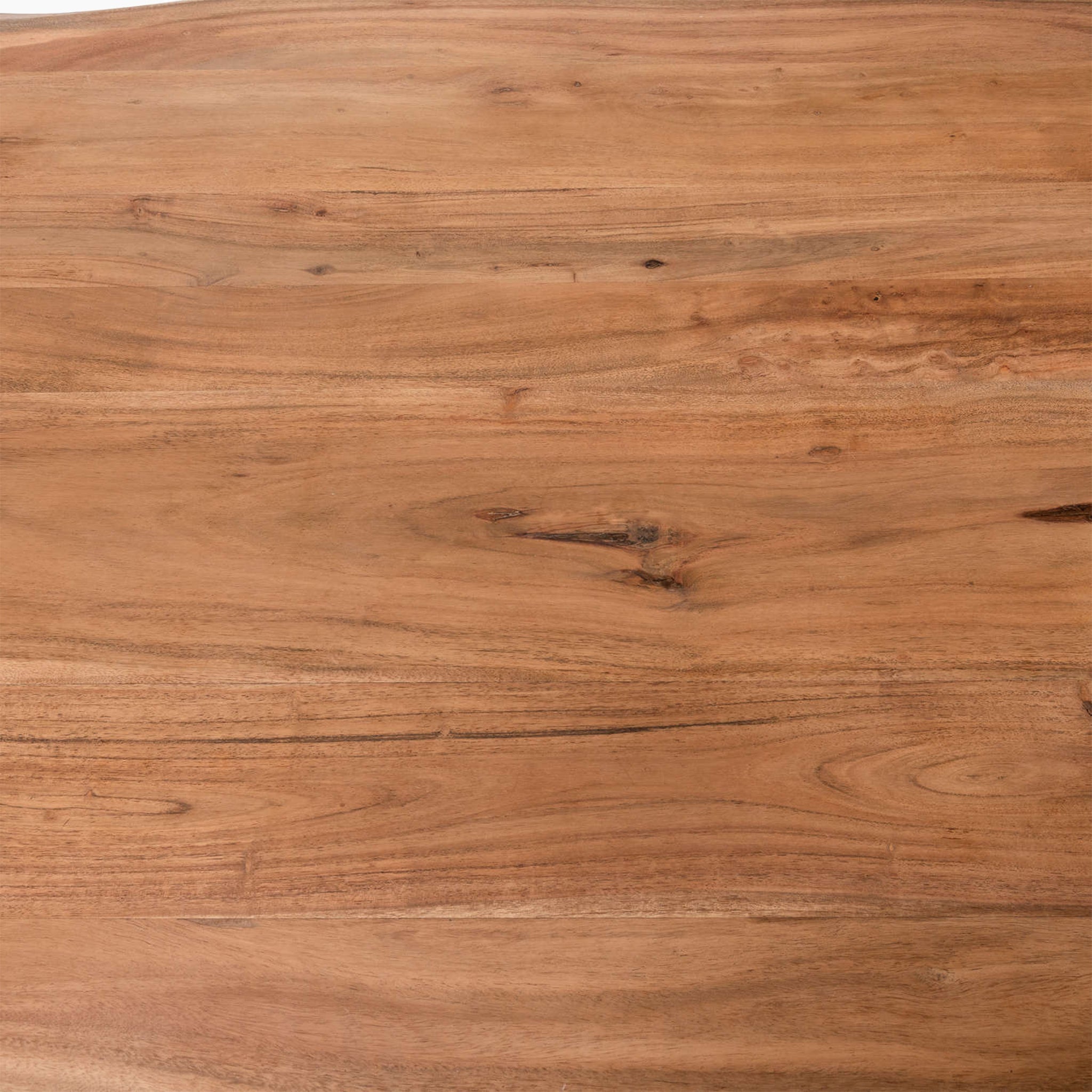 Close-up of an Indian Acacia Wood surface with a natural grain pattern and various shades of brown, capturing the essence of the Live Edge Collection Dining Table with its rustic design elements.
