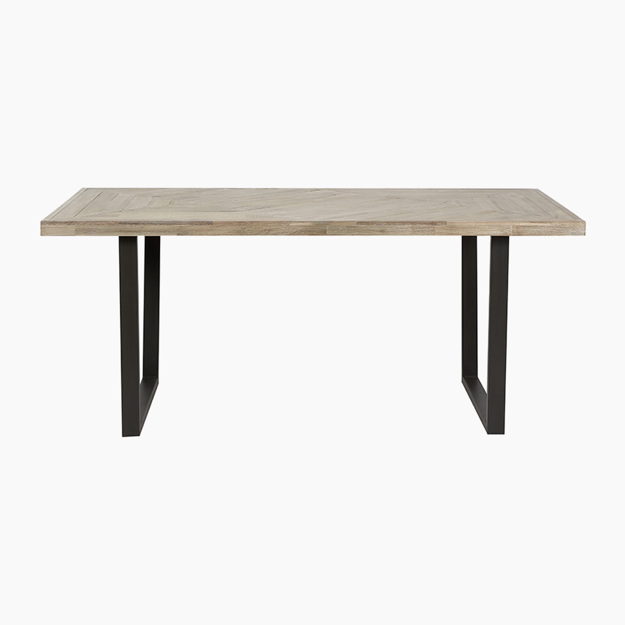 The Pacific Lifestyle - Marca Dining Table features a rectangular acacia wood top with sleek black metal legs, presented from the front, showcasing its industrial design.